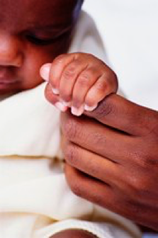 image of infant hold parent's finger